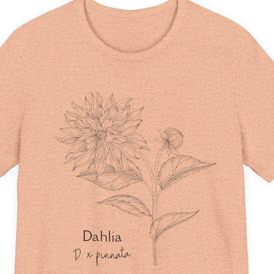 Peach t-shirt with a Dahlia flower design on a white background